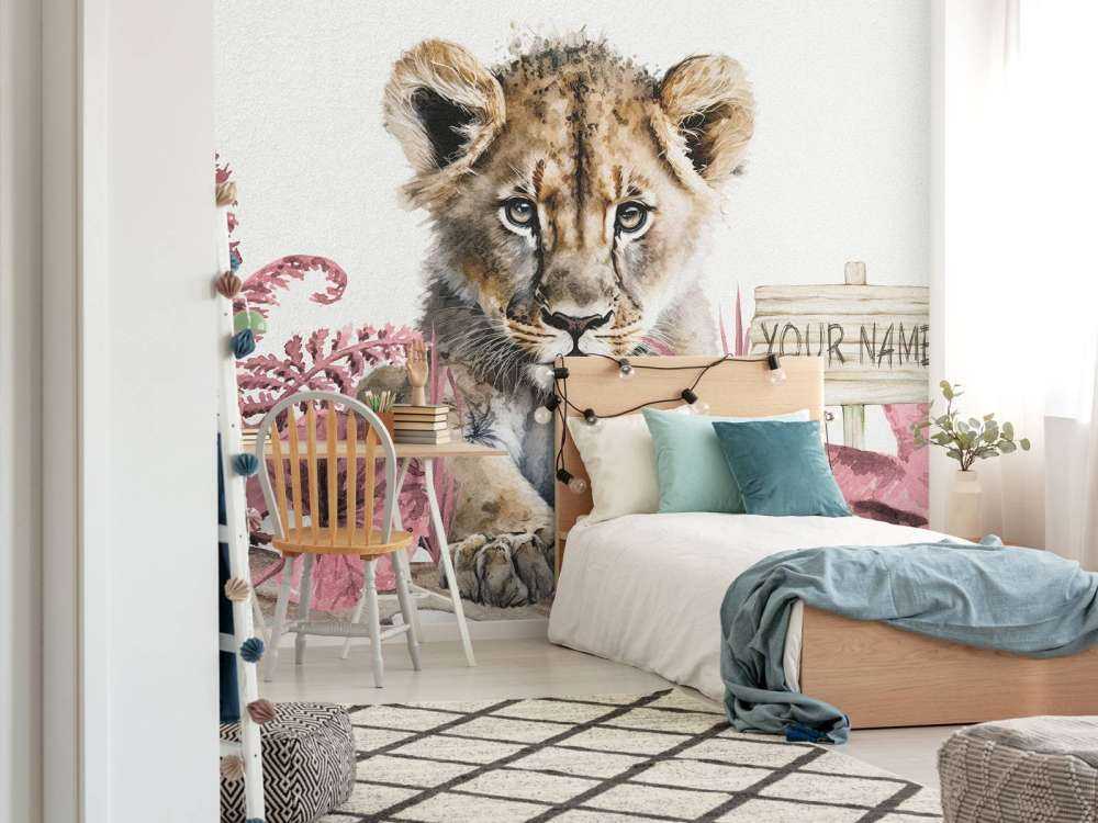 Young lion in the jungle pink