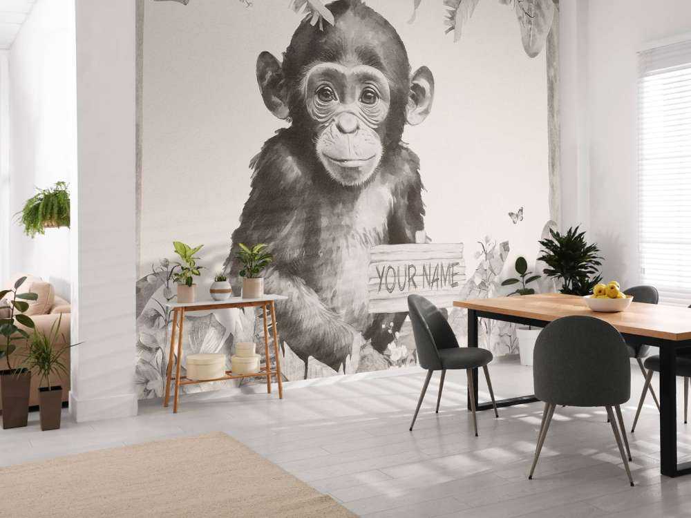 Baby chimpanzee in the jungle beige