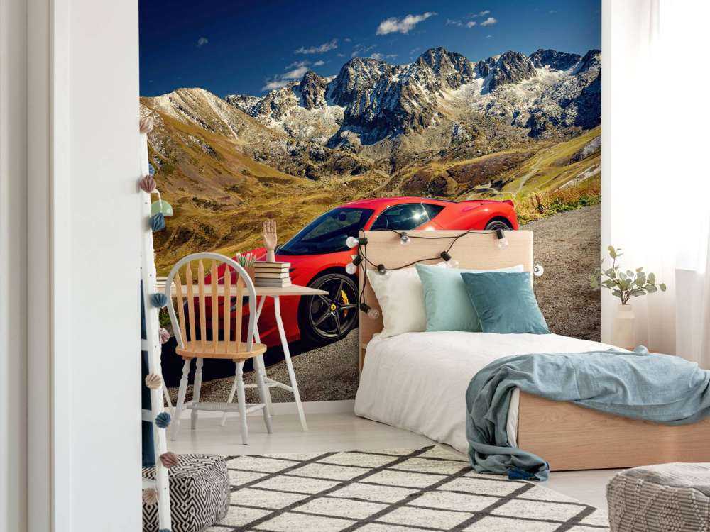 Ferrari 458 with the mountain peaks