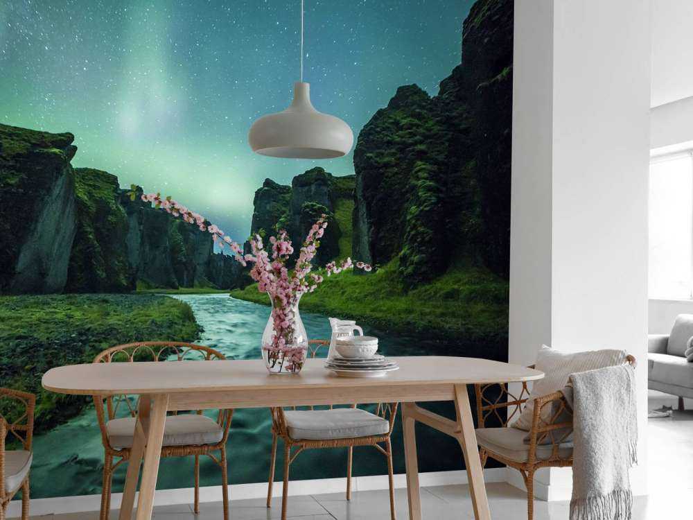 Northern lights above the mountains