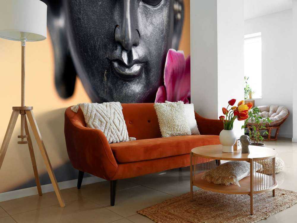 Buddha and pink orchid