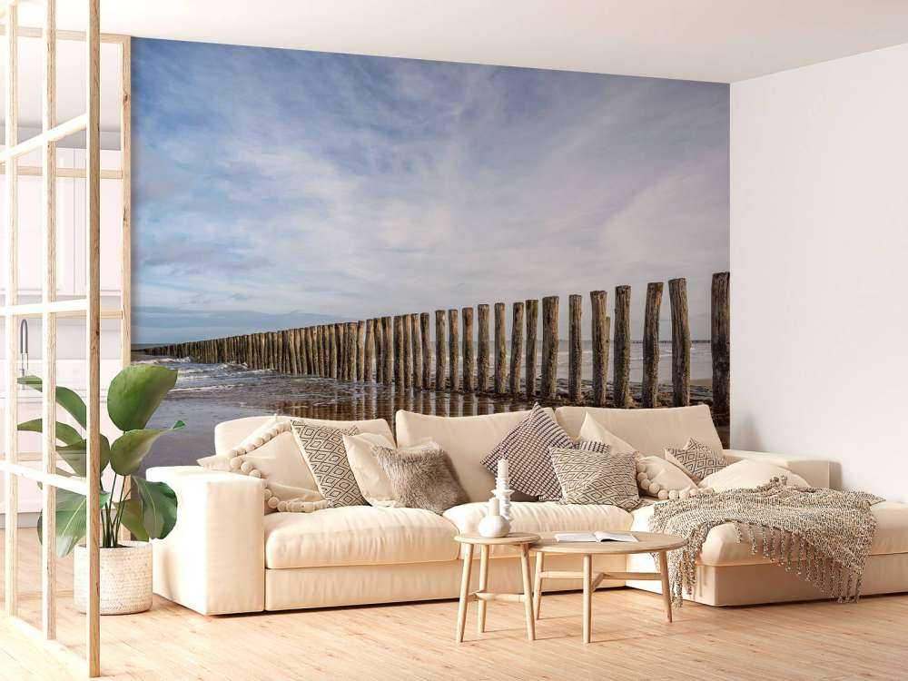 Wooden breakwater on the coast at Cadzand bath