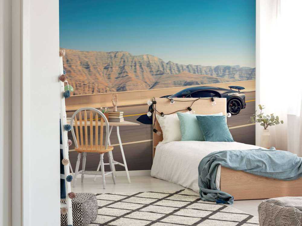 Hypercar against mountainous landscape