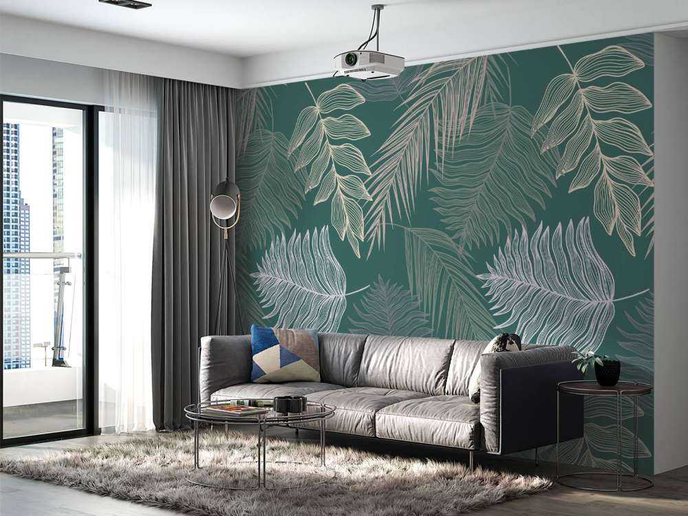 Palm leaf on green background