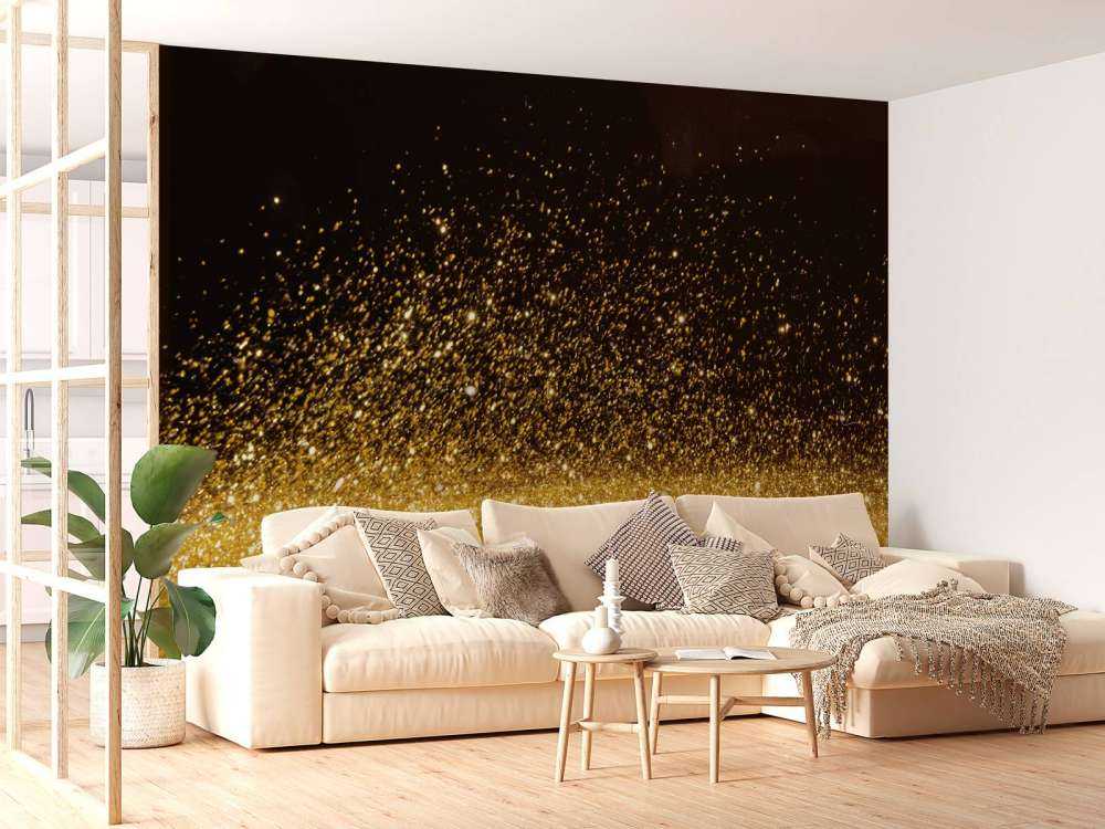 Gouden glitters met een zwarte achtergrond