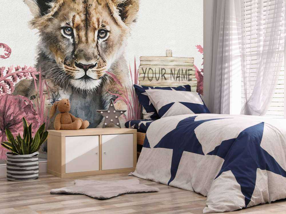 Young lion in the jungle pink