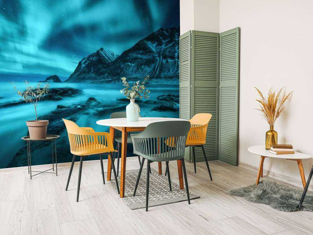 Blue northern lights with mountains