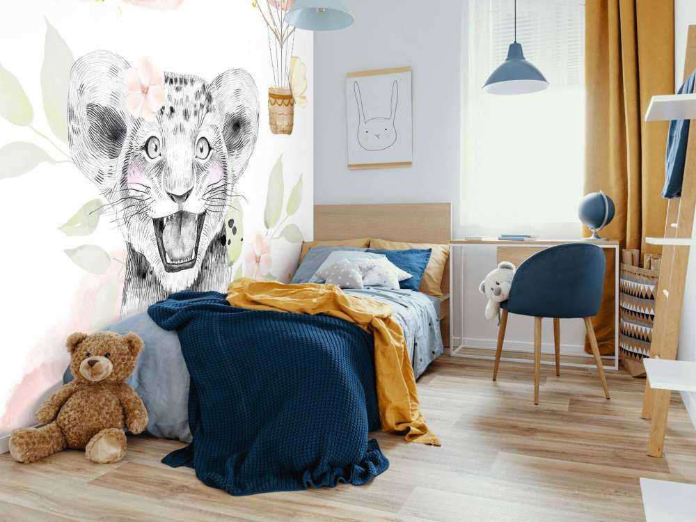 Joyful lion cub and balloon