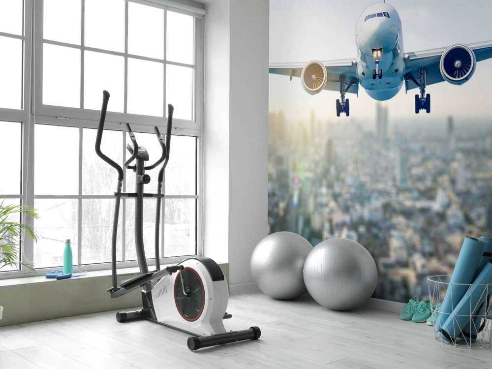 Descending airplane over a city