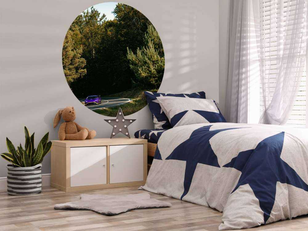 Purple Lamborghini Huracán in woodland landscape