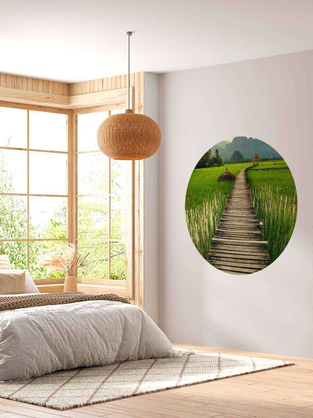 Wooden scaffolding through a rice field