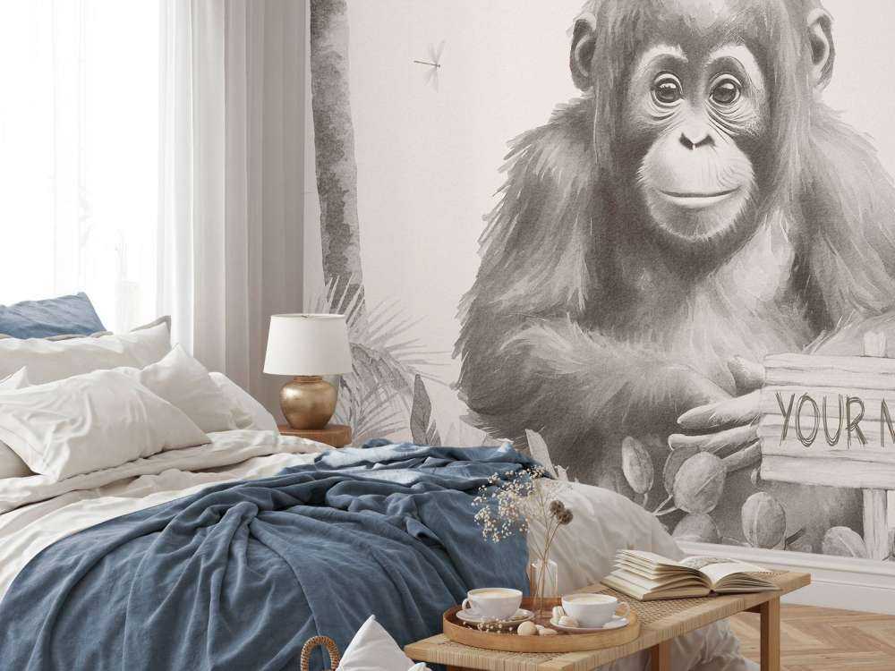 Baby orangutan in the jungle beige