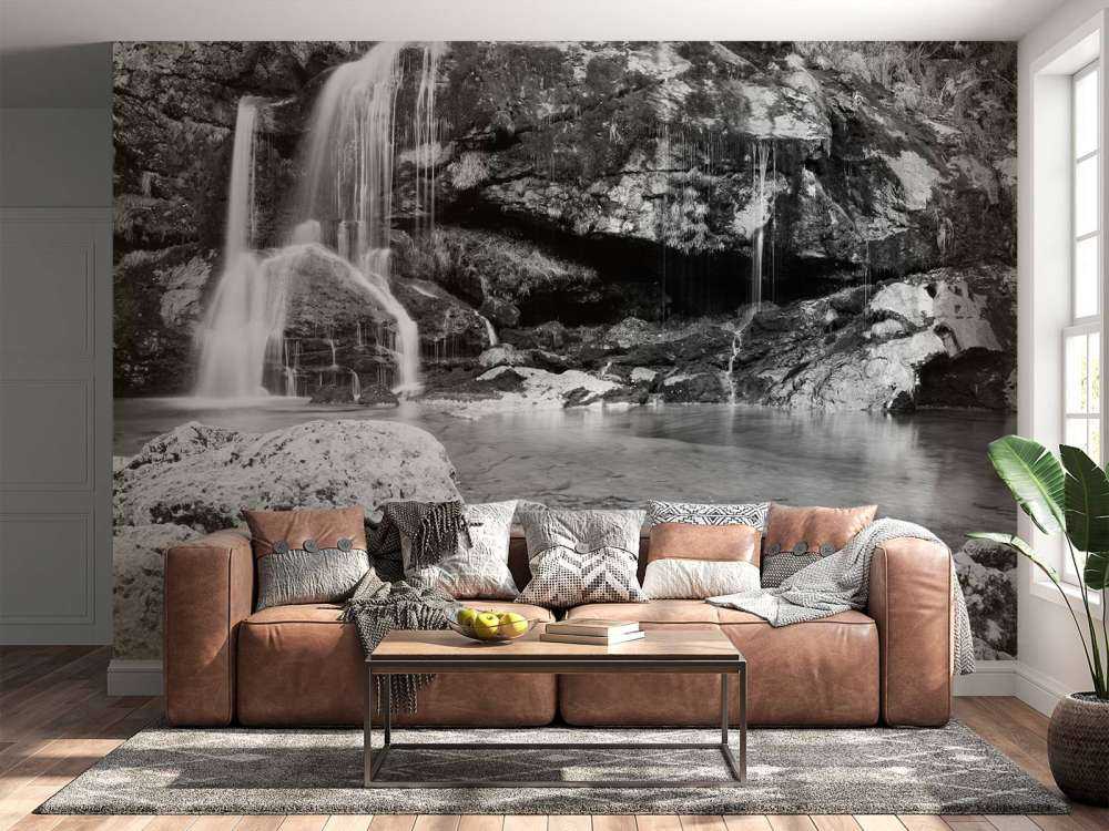 Waterfall over a stone wall