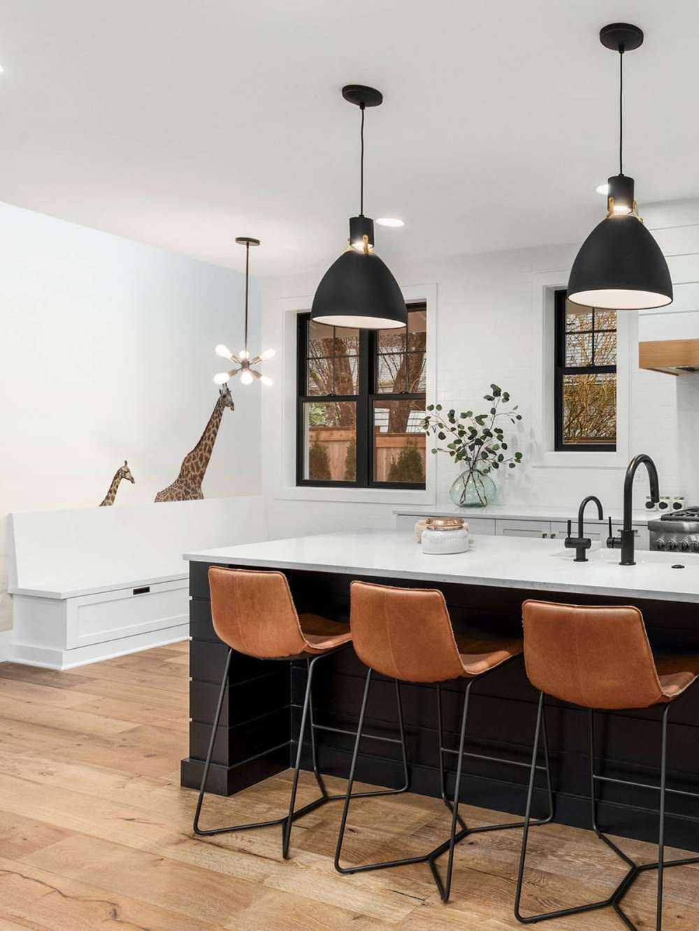 Giraffen op het strand