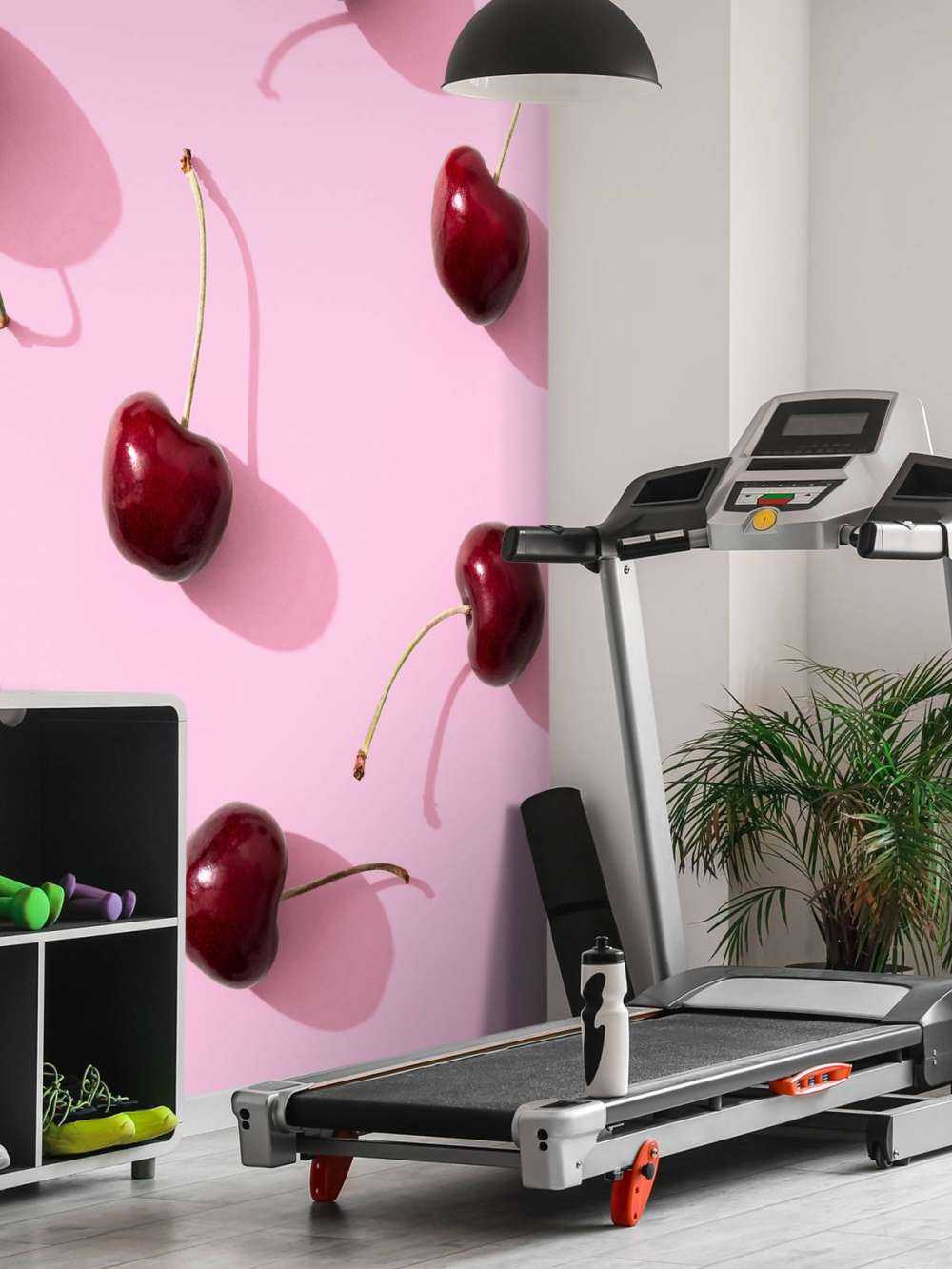 Cherries on pink background
