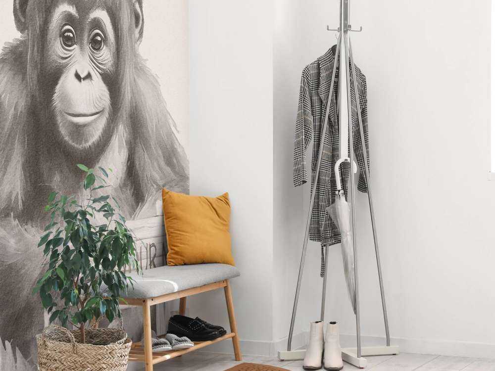 Baby orangutan in the jungle beige