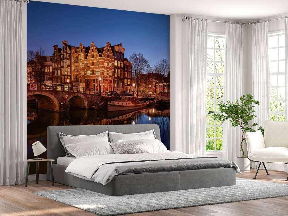 Illuminated houses along the canal