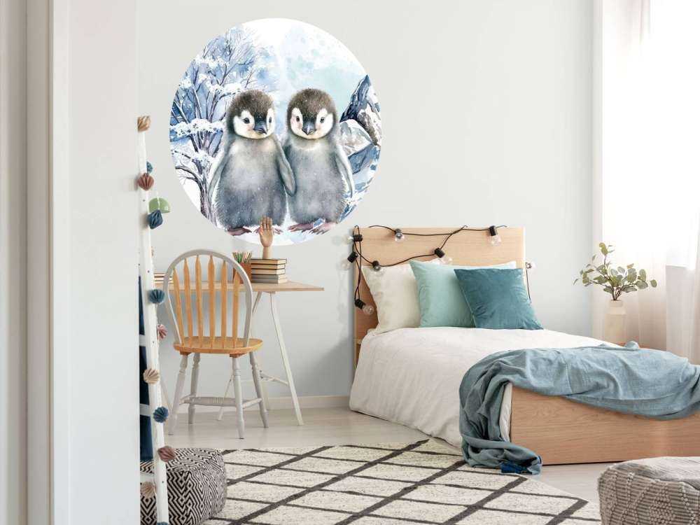 Cute penguins in winter landscape