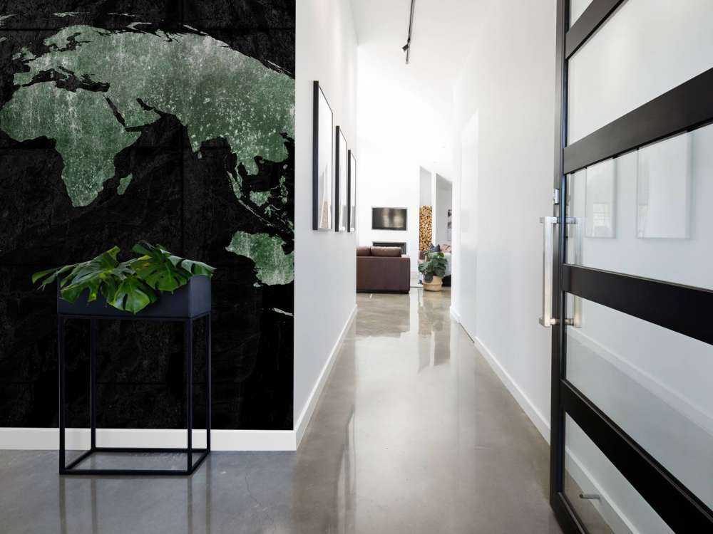 Green world map on concrete