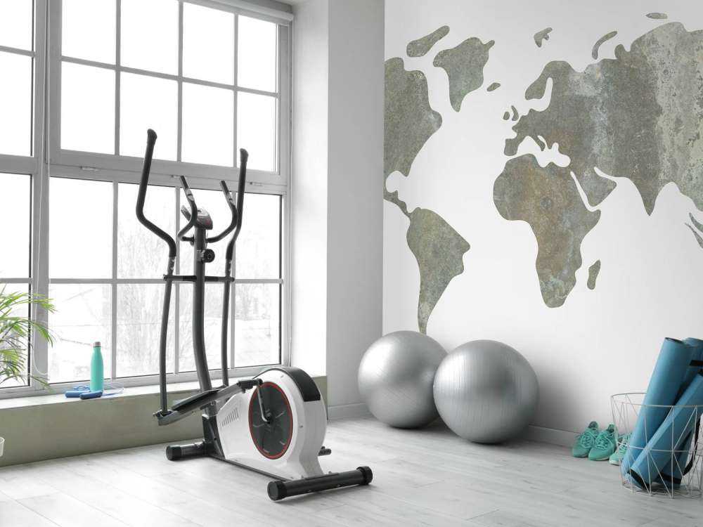 Green world map with metal structure