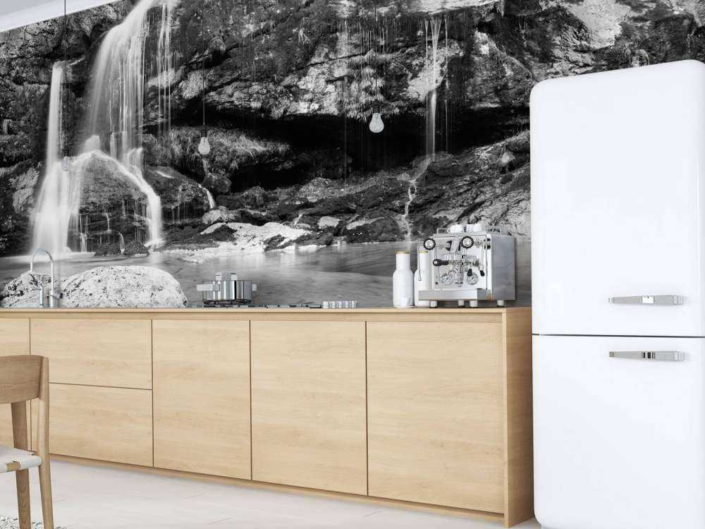 Waterfall over a stone wall