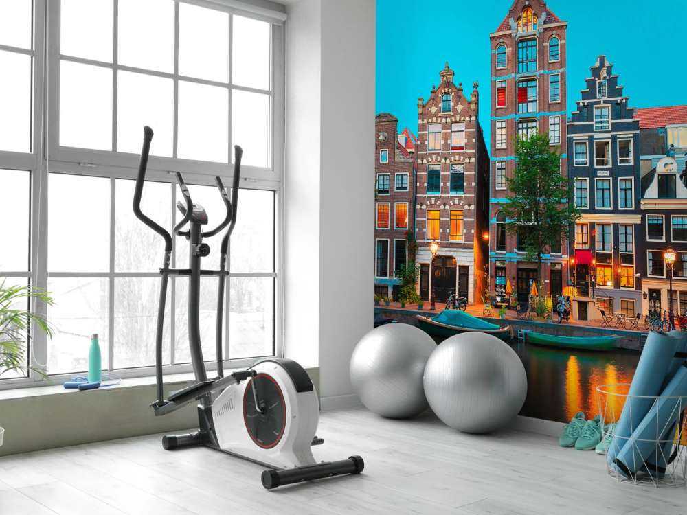 Amsterdamse grachtenpanden in de avond