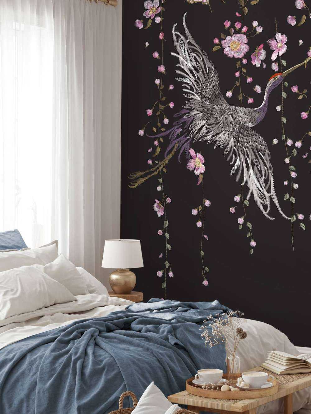 Cranes with pink flowers