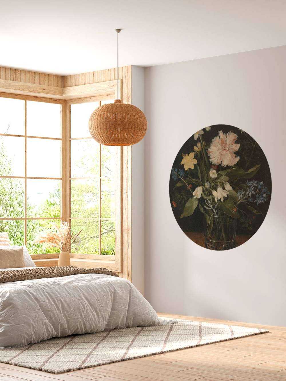 Still life with flowers in a glass