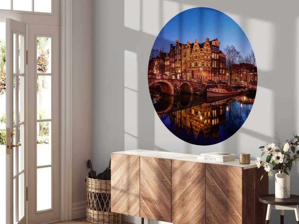 Illuminated houses along the canal