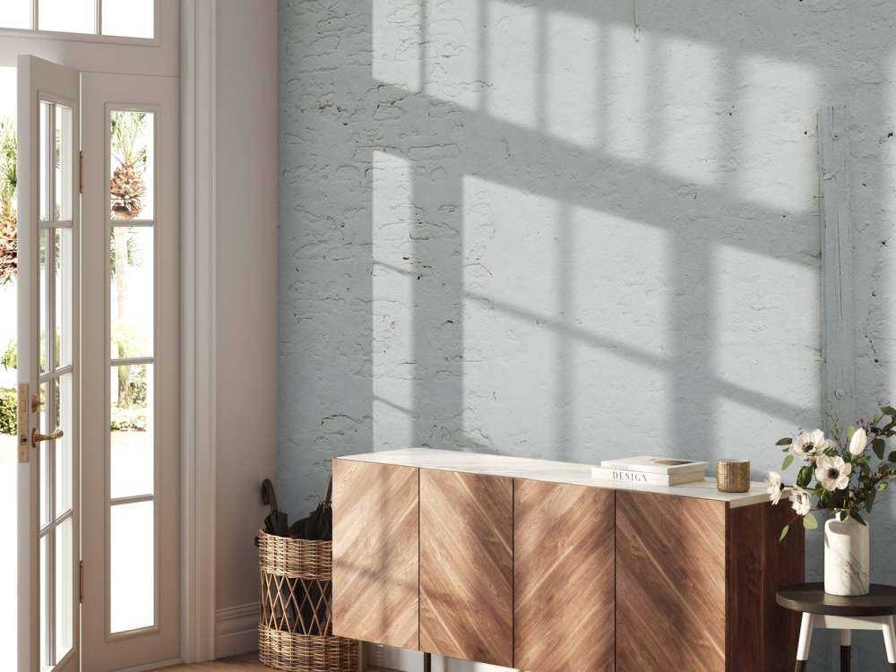 Wall with white stucco and beam