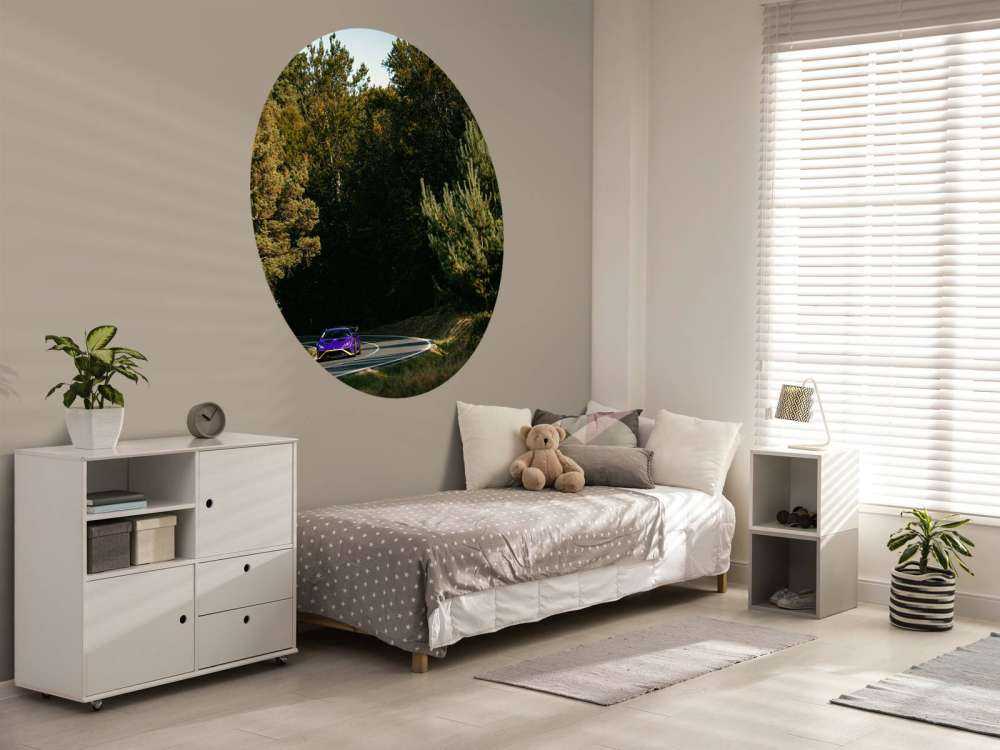 Purple Lamborghini Huracán in woodland landscape