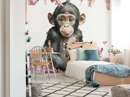 Baby chimpanzee in the jungle pink