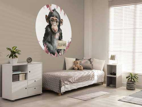 Baby chimpanzee in the jungle pink