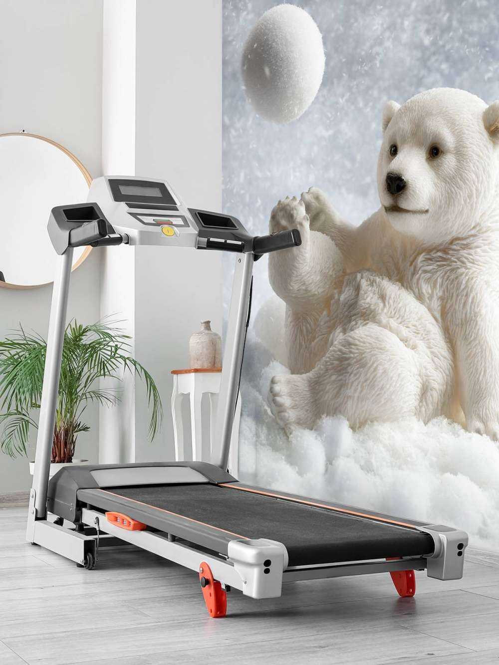 Een ijsbeer speelt met een sneeuwbal