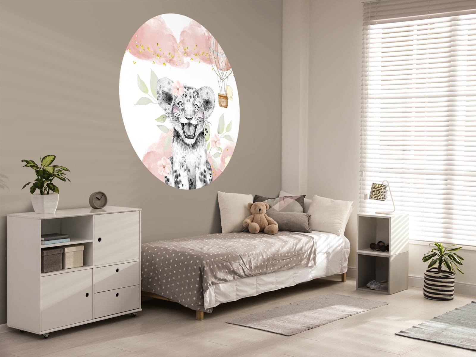 Joyful lion cub and balloon