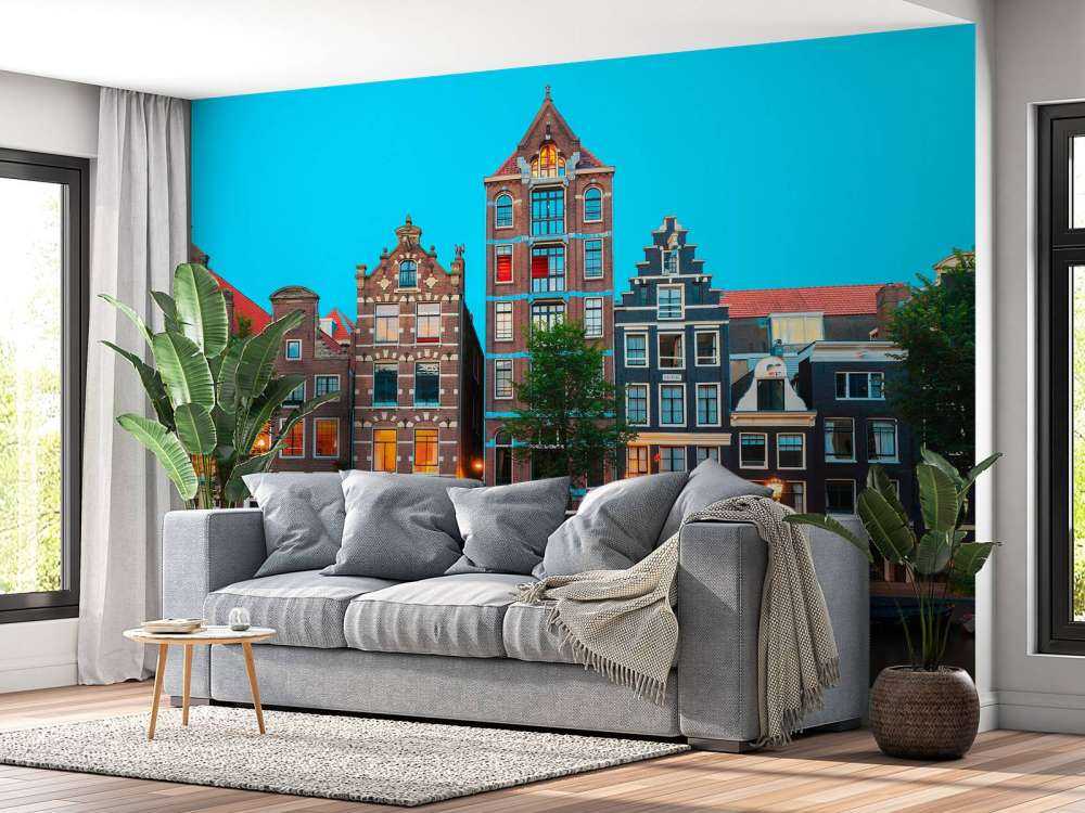 Amsterdamse grachtenpanden in de avond