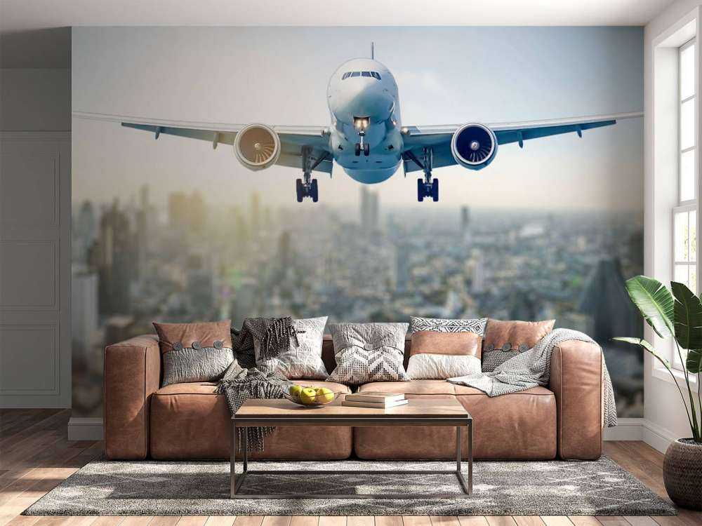 Descending airplane over a city