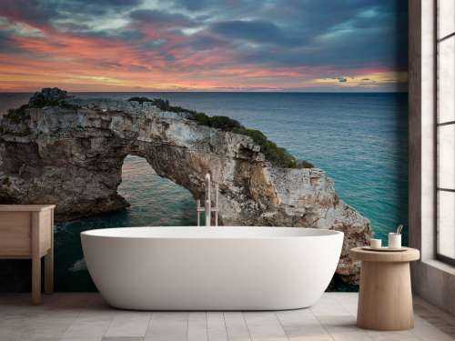 Curved rock in the sea