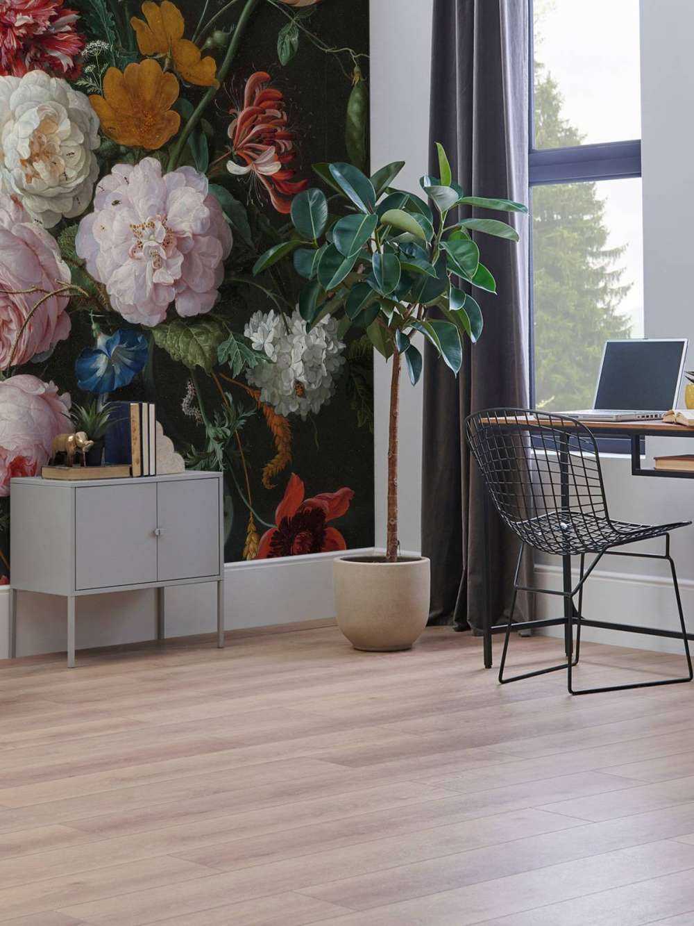 Still life with flowers in a glass vase