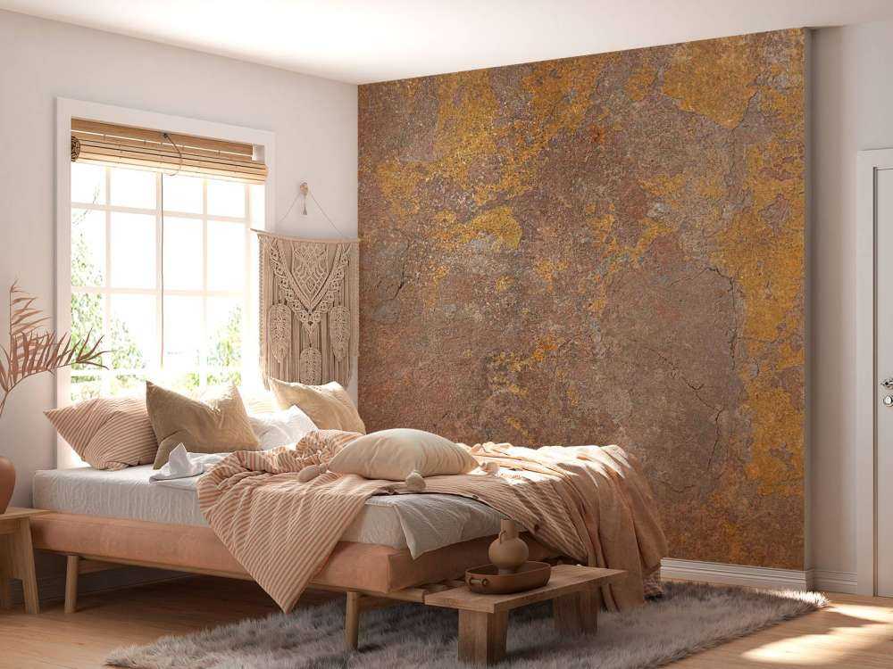 Old wall with yellow stucco