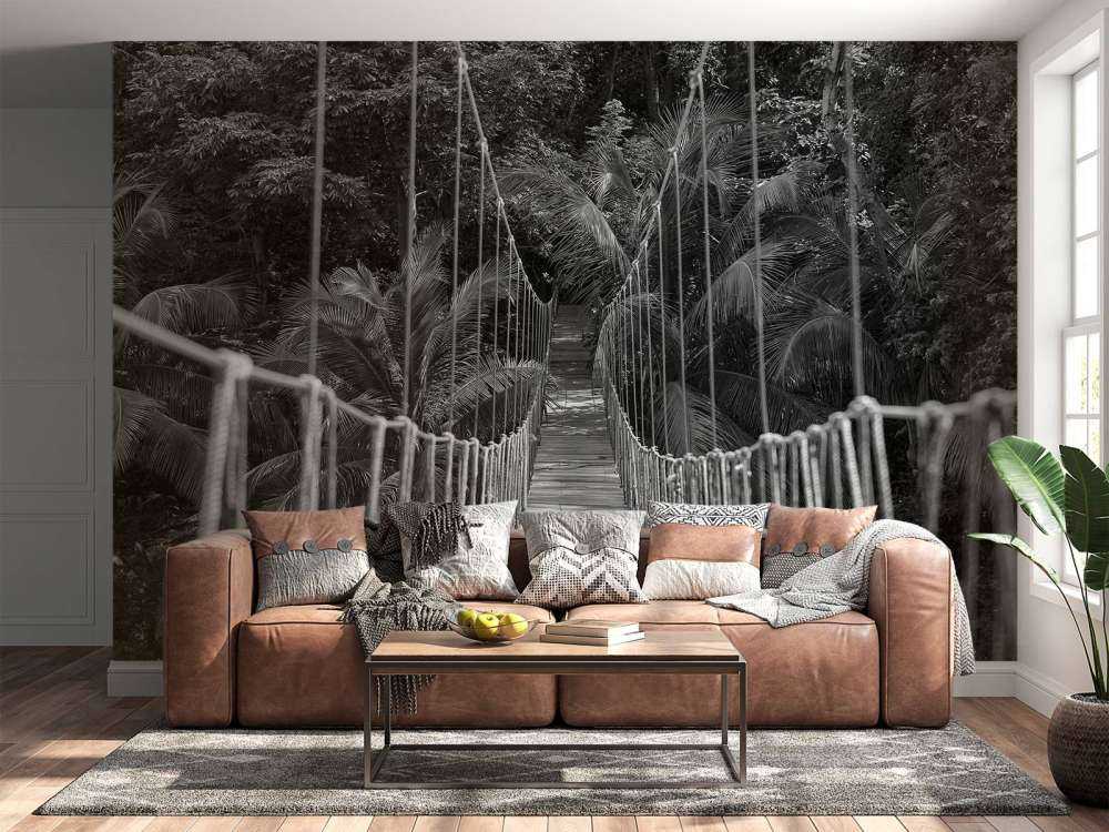 Wooden bridge between the palm trees