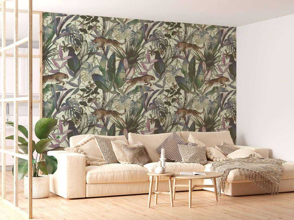 Cheetah between the tropical leaves