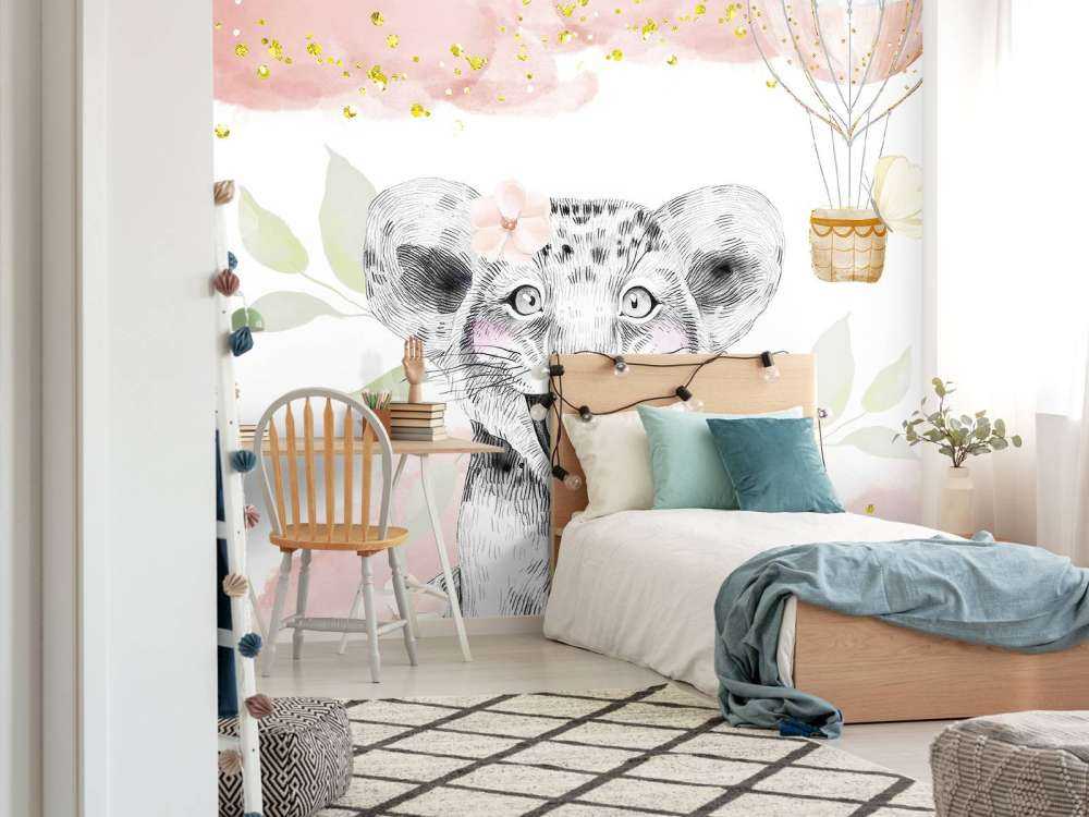 Joyful lion cub and balloon