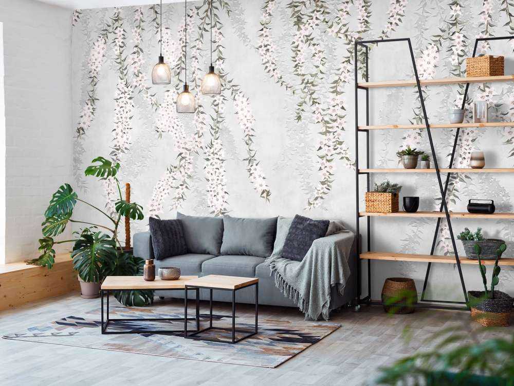 Flower branches on light blue concrete