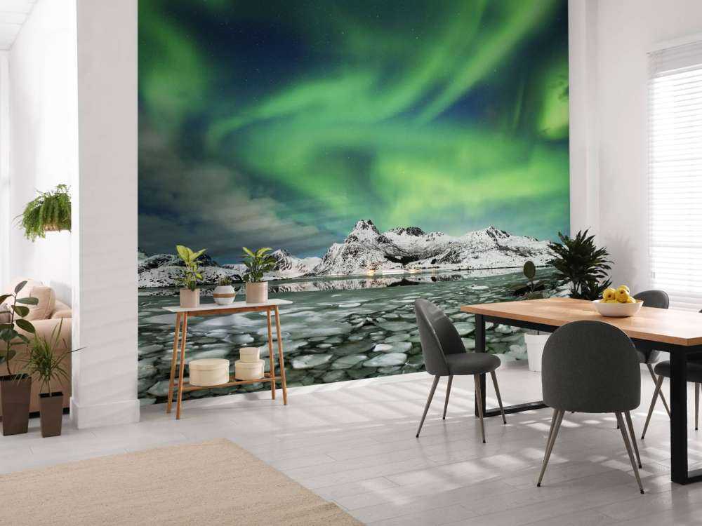 Northern lights above winter landscape