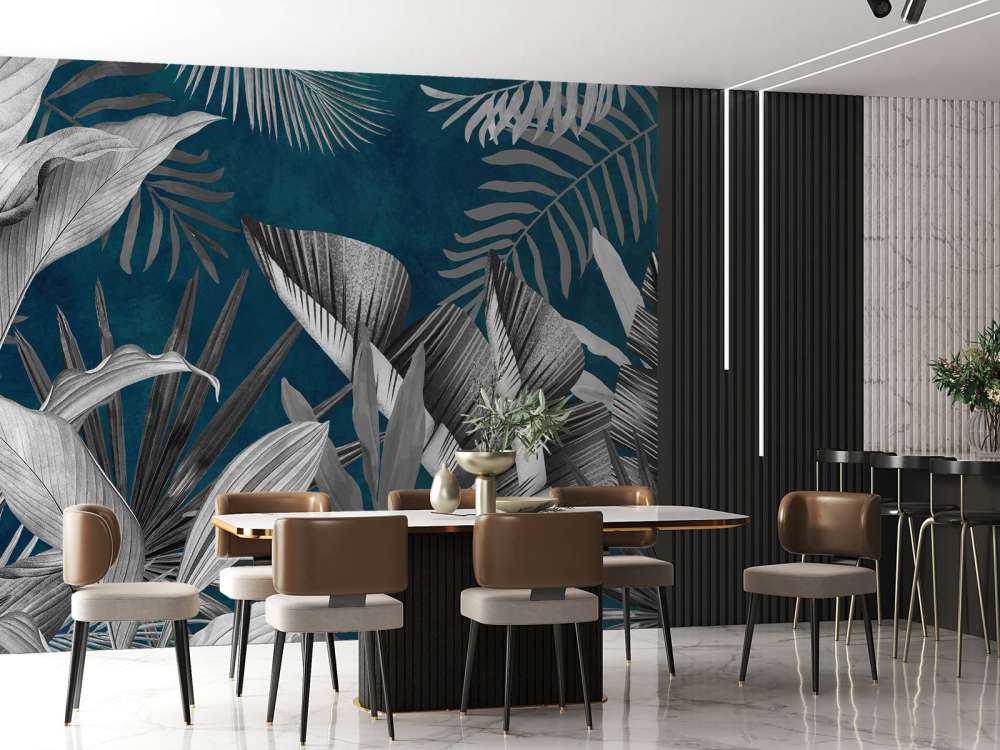 Tropical leaves on a blue background