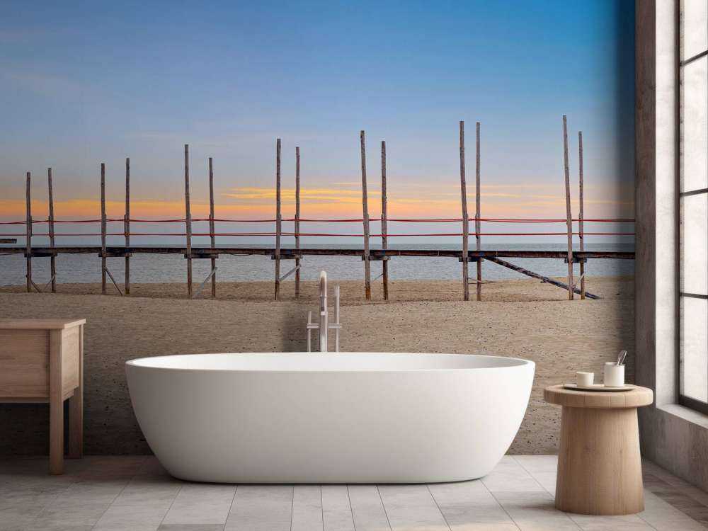 Long jetty with wooden posts