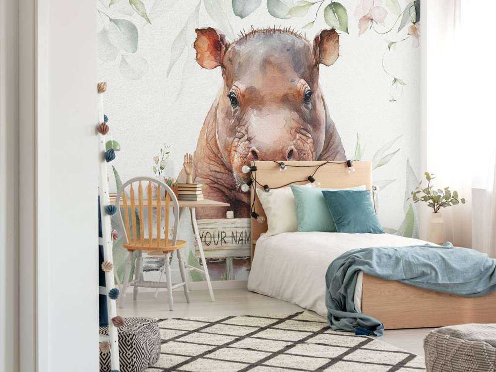 Baby hippo in the leaves