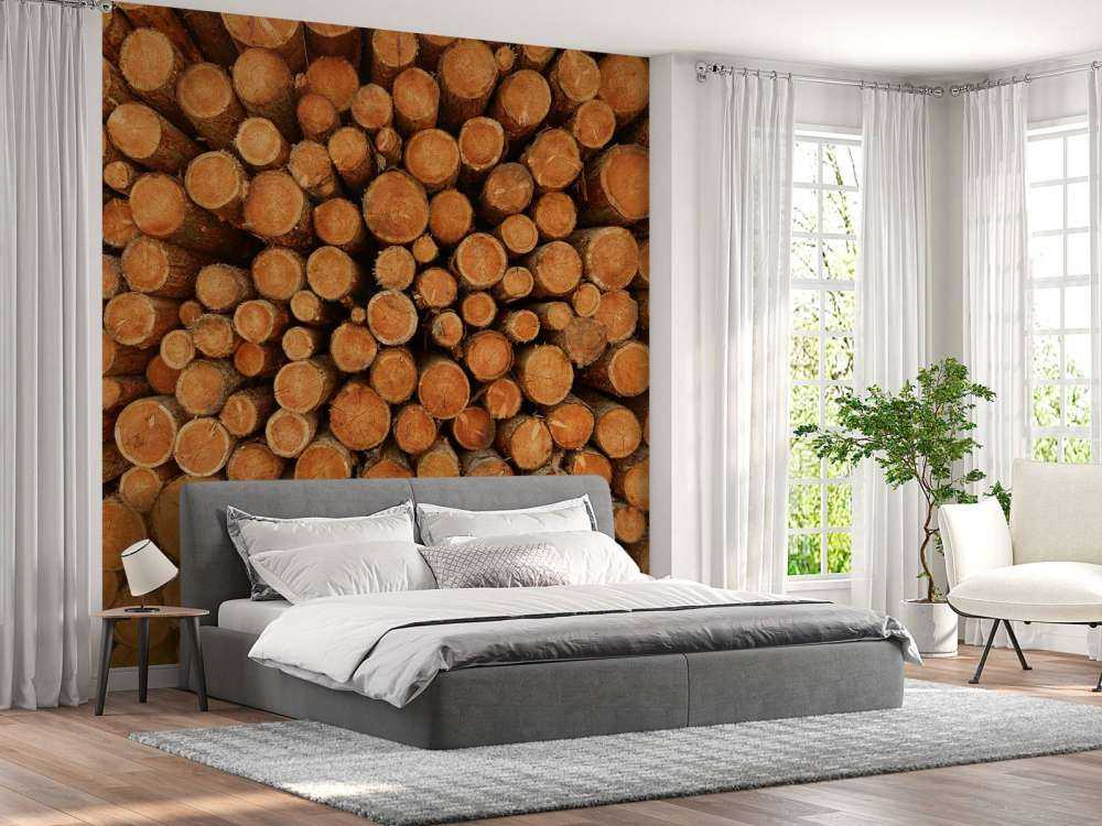 Pile of dark tree trunks