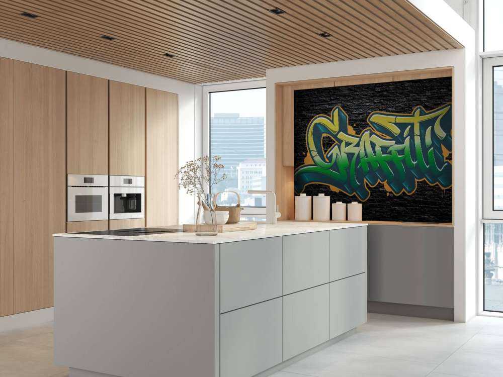 Graffiti on wall of black stones